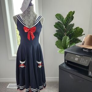 Navy Dress with Red Bow and Nautical Accents